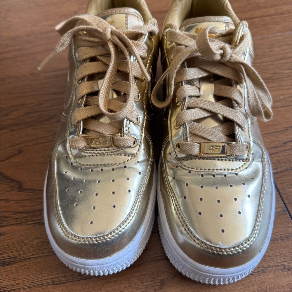 Nike AirForce 1 liquid gold size 6